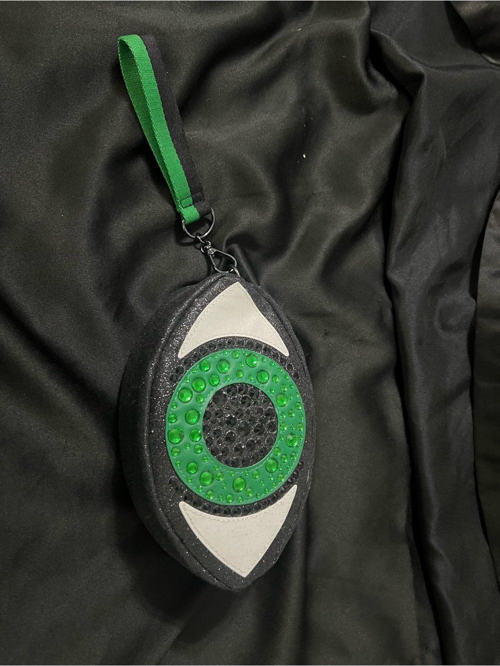 Green eye wristlet